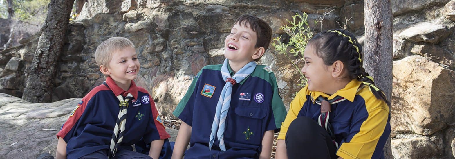 Three Scouts laughing
